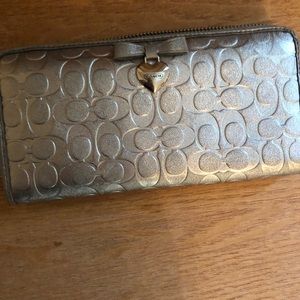 Used Coach zip around accordion wallet